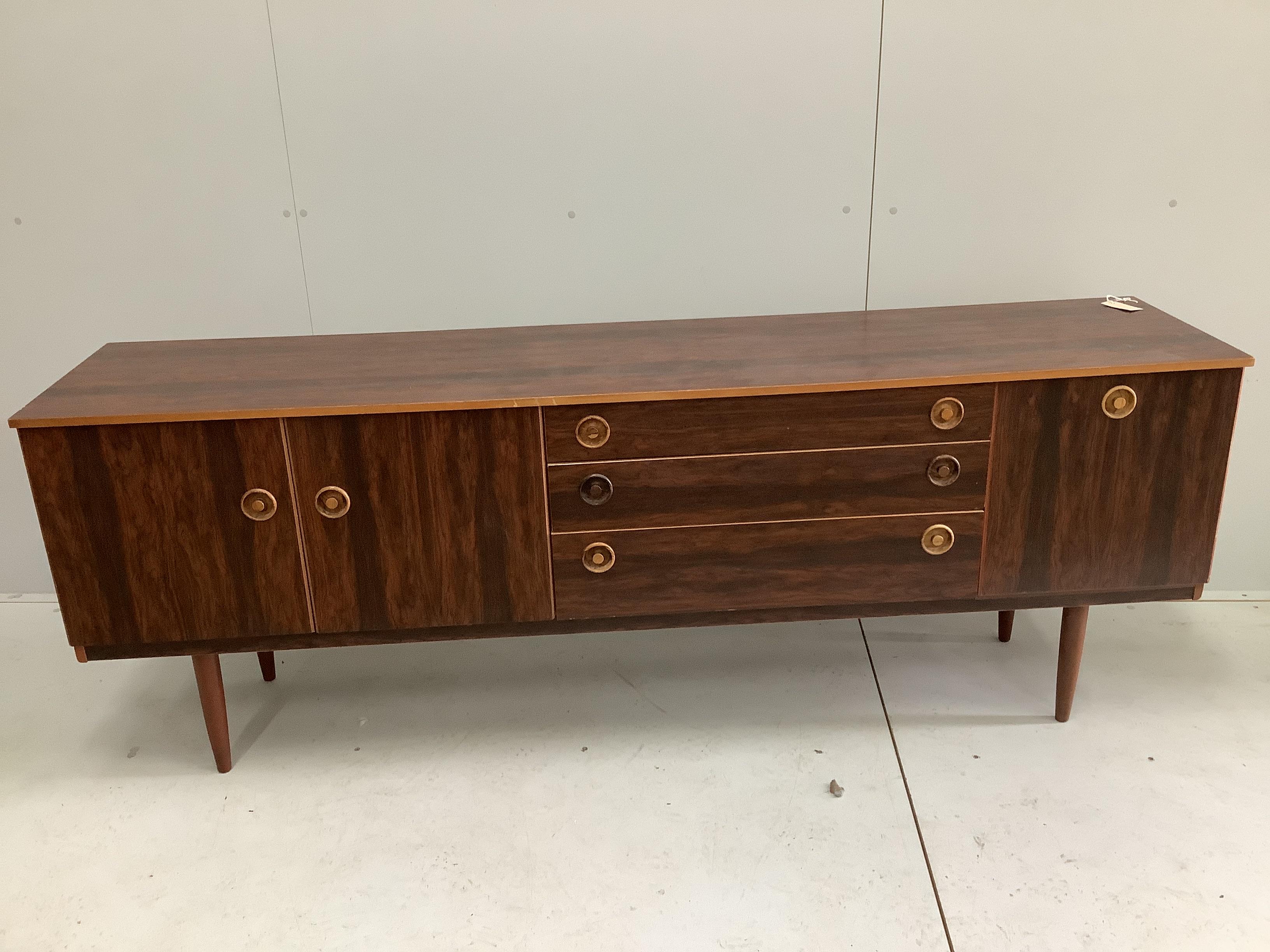 A mid century Schreiber faux rosewood sideboard, width 198cm, depth 43cm, height 73cm